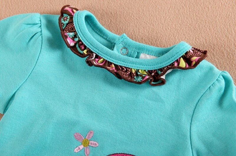 Baby girl turquoise long sleeve tunic with floral frill neckline and embroidered design