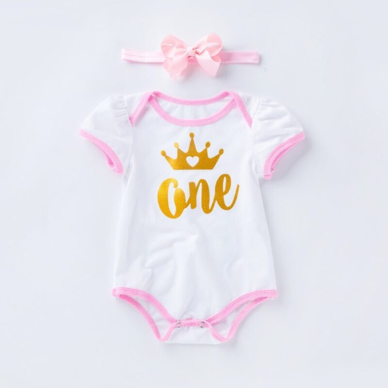 Baby girl first birthday bodysuit with gold one print, matching headband and soft cotton fabric