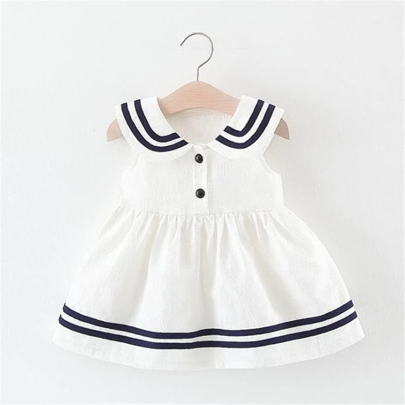 Cute baby in white clearance dress