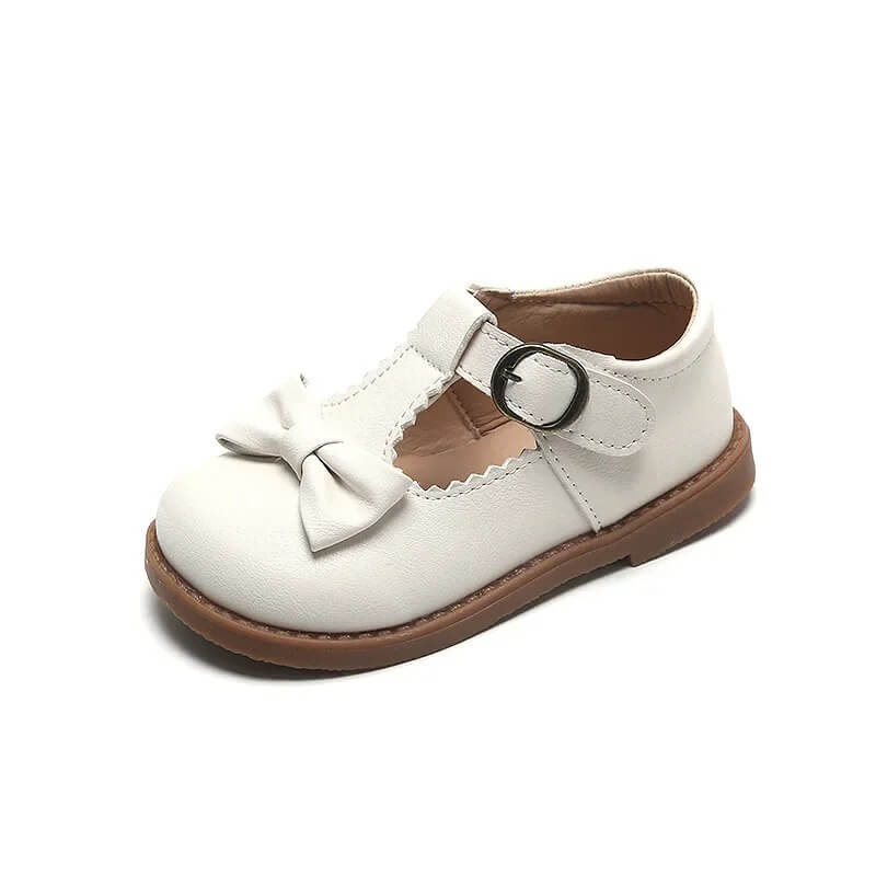 Off white girls Mary Jane T-Bar shoes with bow accent and adjustable buckle closure