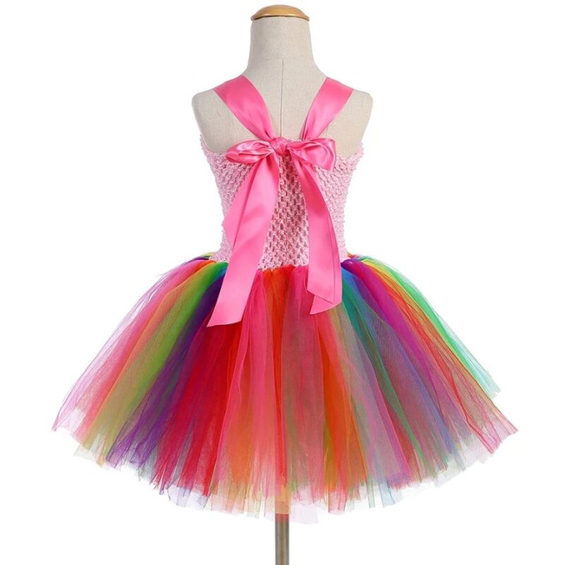 Girls rainbow unicorn tutu dress with colourful tulle skirt, pink crochet bodice and large satin bow back
