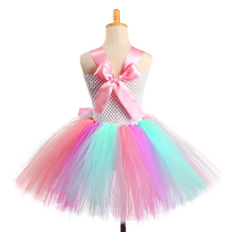 Girls pastel rainbow unicorn tutu dress with soft tulle skirt, crochet bodice and large pink satin bow