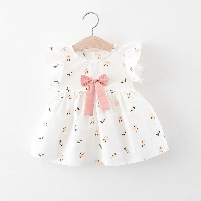 White baby girl rabbit print dress with pink bow and flutter sleeves