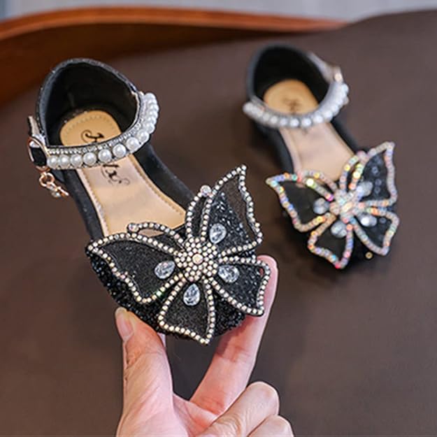 Girls black sparkly shoes with butterfly bow embellishment and pearl ankle strap for formal events