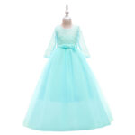 Mint green girls lace princess gown with long sleeves, satin waist bow and flowing layered tulle skirt for weddings and formal occasions.