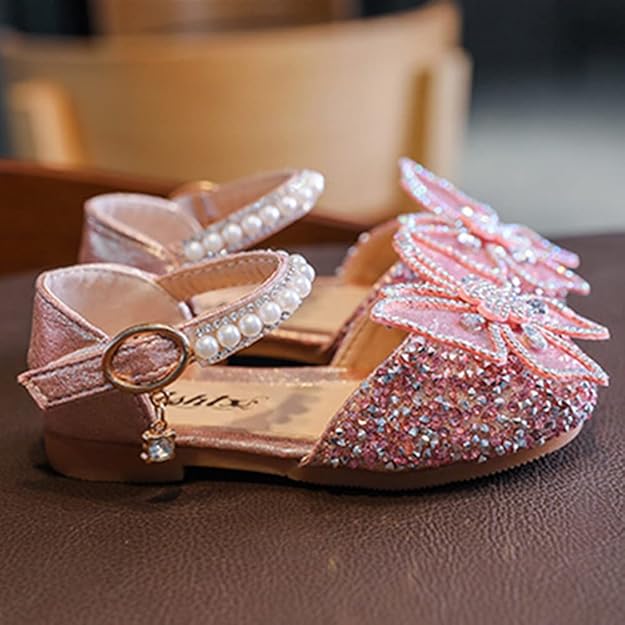 Pink girls glitter butterfly bow shoes with pearl strap and rhinestone detailing, stylish occasion footwear for kids