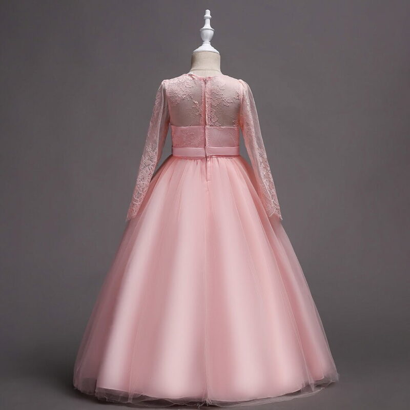 Back view of pink flower girl dress with lace bodice, long sleeves and voluminous tulle skirt