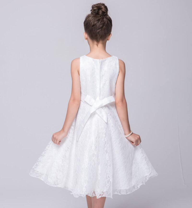 Back view of white lace flower girl dress with satin bow sash and full lace skirt