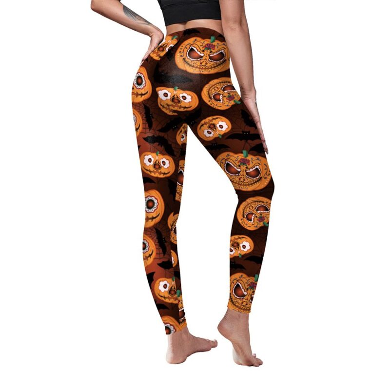 Back view of women’s pumpkin print Halloween leggings