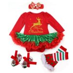 Baby girl Christmas outfit flat lay with printed headband and ribbon tie shoes