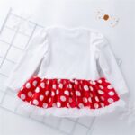 Back view of baby girl's Christmas romper dress with red and white polka dot ruffle skirt