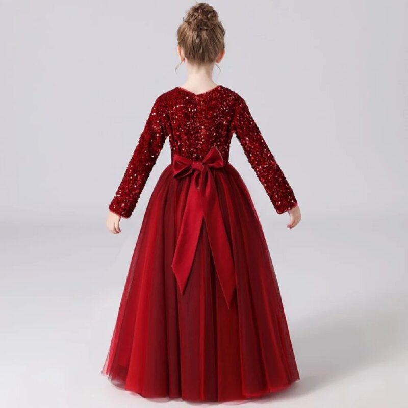 Back view of girls burgundy red sequin flower girl dress with oversized satin bow and layered tulle skirt