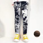 Black and white flower print fleece leggings for girls with floral design and warm brown fleece lining