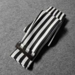 Black White Stripe Winter Leggings for Girls (5) Folded black and white striped fleece leggings for girls showing the warm fleece lining at the cuffs.