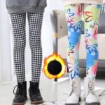 Girls patterned winter leggings in houndstooth and colourful floral designs with warm fleece lining