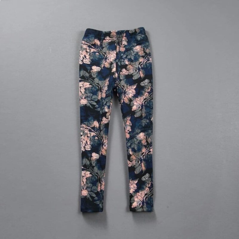 Full length midnight bloom leggings for girls featuring a pink floral print on a dark blue background.