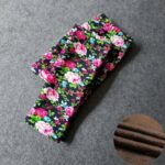 Folded navy blue rose print winter leggings for girls with pink flowers, green leaves and soft fleece lining.