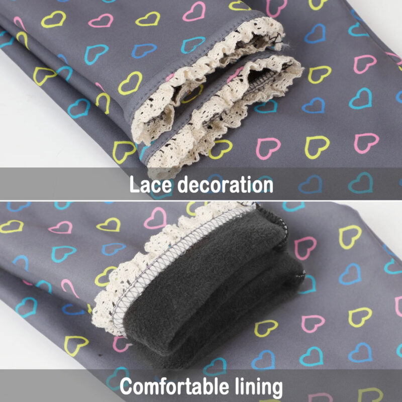 Close-up of grey heart print winter leggings for kids showing lace ankle trim and warm fleece lining.