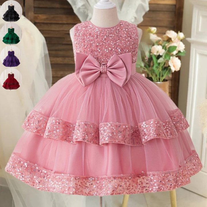 Sparkling Sequin Princess Ball Gown for Girls Pink sequin princess ball gown for girls with sleeveless bodice, large satin bow and layered tulle skirt