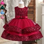 Red sparkling sequin and tulle party dress for little girls with sleeveless bodice, bow waist and layered sequin trim