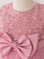 pink Sparkling Sequin Princess Ball Gown for Girls (4) Close-up of pink sequin bodice and large satin bow with pearl detail on girls princess ball gown