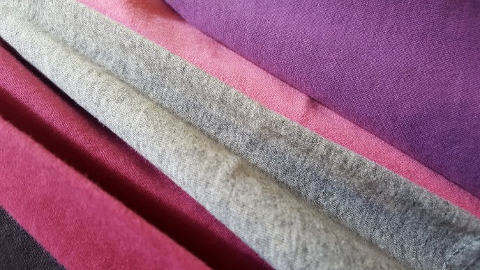 Cotton-Spandex Blend: The Ideal Fabric for Comfortable Performance Wear - Fabulous Bargains Galore Shot of different coloured cotton and spandex fabric
