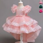 Flutter Sleeve Sequin High-Low Party Dress Light pink girls high low party dress with sparkling sequin bodice, flutter sleeves, layered tulle skirt and sequin trim.