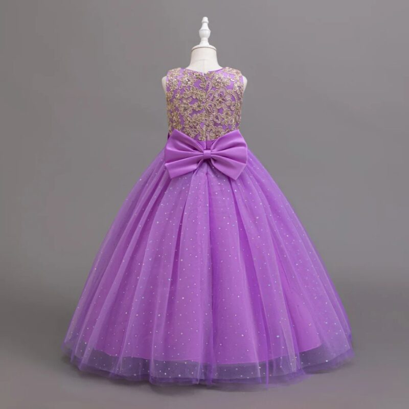 Back view of purple girls ball gown with gold sequin floral bodice, large satin bow and glitter tulle skirt