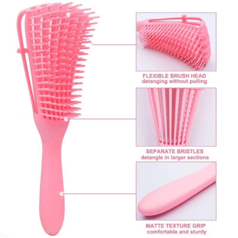 Flexible detangling brush showing brush head, separated bristles and ergonomic handle designed for curly and textured hair