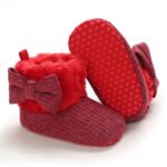 Baby ribbed knit winter boots with anti slip sole, faux fur trim and side bow