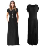 Women's black maxi dress with pockets shown on model beside garment only
