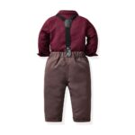 Back view of boys burgundy shirt and brown trousers with black adjustable suspenders