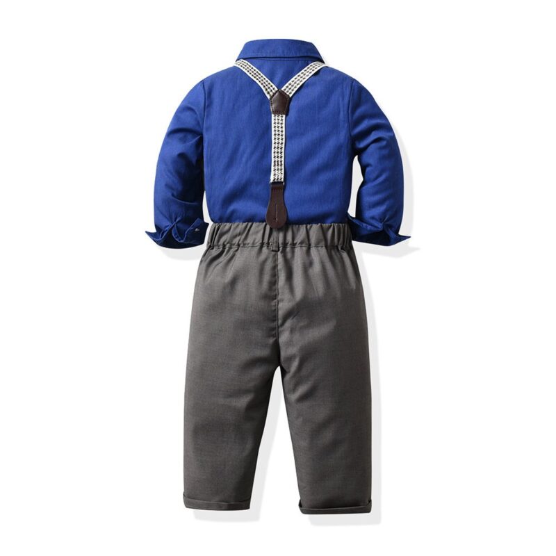 Back view of boys royal blue shirt and grey trousers with adjustable suspenders