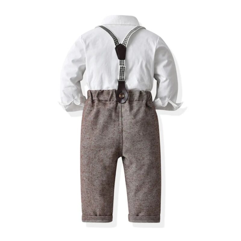 Back view of boys white shirt and brown tweed trousers with adjustable suspenders