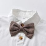Boys White Shirt and Tweed Trousers Outfit Set 3 Close up of boys tweed herringbone bow tie on white formal shirt