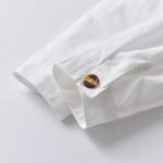 Boys White Shirt and Tweed Trousers Outfit Set (5) Close up of boys white shirt cuff with decorative button fastening