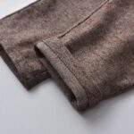 Boys White Shirt and Tweed Trousers Outfit Set 9 Close up of folded hem on boys brown tweed formal trousers