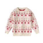 Cream kids Christmas jumper with red snowflakes, beige reindeer and pink Fair Isle pattern, finished with ribbed trims.