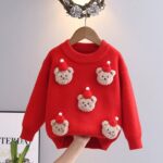Kids Teddy Bear Christmas Jumper (1) Red kids Christmas jumper with five fluffy teddy bear appliqués wearing festive red bobble hats.